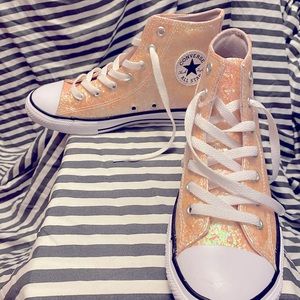 Pink shiny 2.5y converse chuck taylors high tops. Never worn